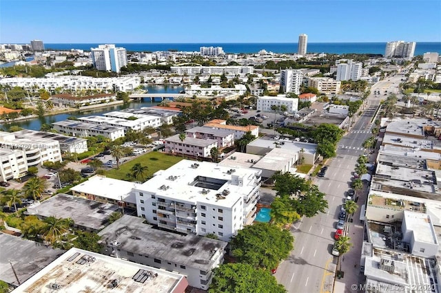 aerial view with a water view and a city view