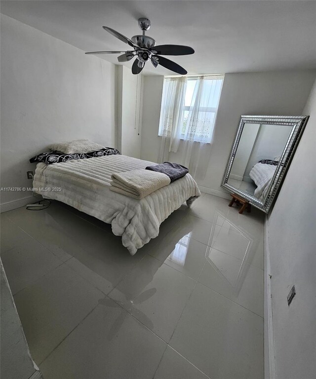 1145 Normandy Dr Unit 504, Miami Beach, FL 33141 - bathroom with toilet, vanity, baseboards, and tile patterned flooring
