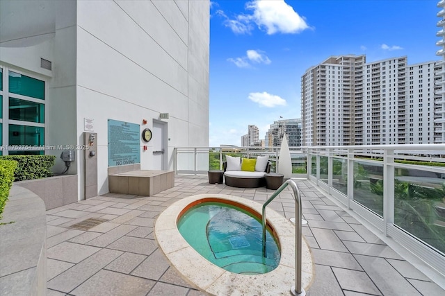 view of pool featuring a city view