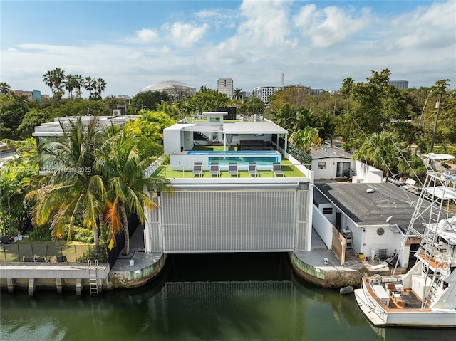 birds eye view of property featuring a water view