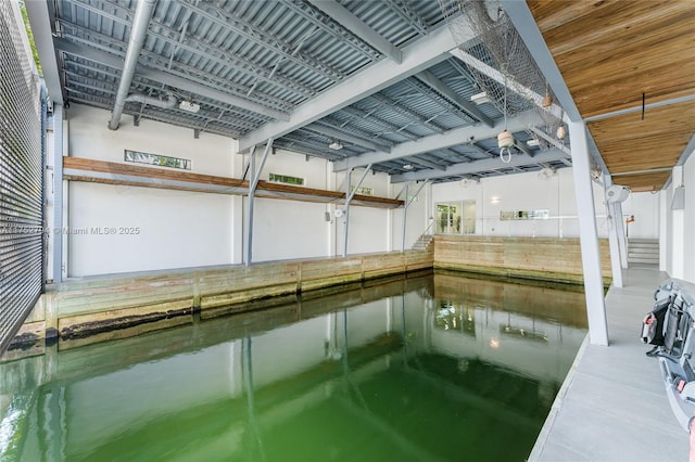 641 NW 7th St Rd, Miami, FL 33136 - view of dock featuring a water view