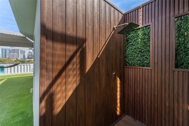 641 NW 7th St Rd, Miami, FL 33136 - view of gate featuring a lawn