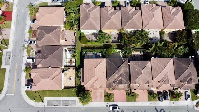 birds eye view of property with a residential view