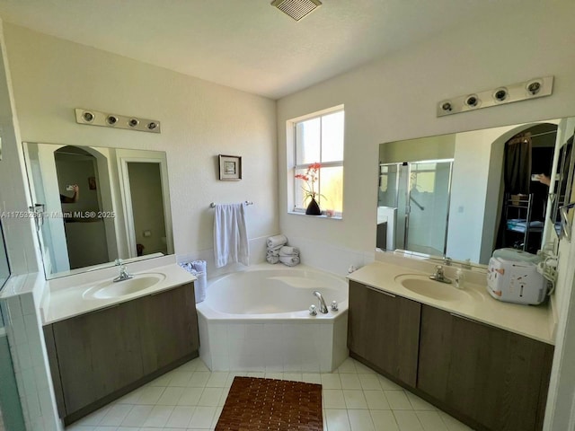 full bath featuring visible vents, a sink, a shower stall, and a bath