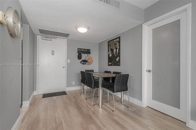 777 S Federal Hwy Unit Rp817, Pompano Beach, FL 33062 - dining room with light wood-style floors and baseboards