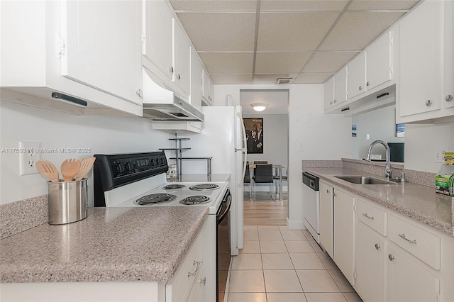 777 S Federal Hwy Unit Rp817, Pompano Beach, FL 33062 - kitchen featuring range with electric stovetop, a sink, under cabinet range hood, light tile patterned floors, and a drop ceiling