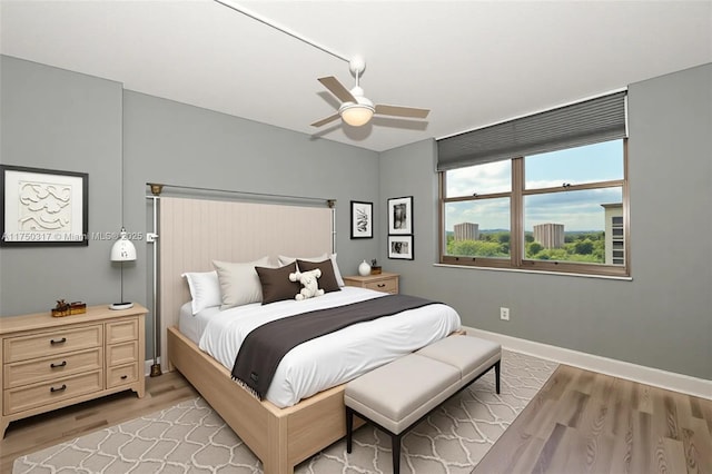 777 S Federal Hwy Unit Rp817, Pompano Beach, FL 33062 - bedroom with light wood-style floors, baseboards, and ceiling fan