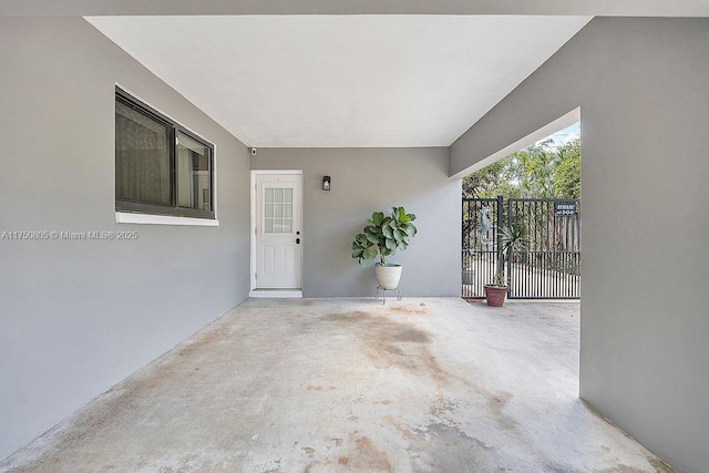 view of patio featuring fence