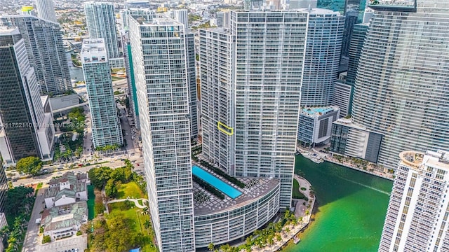 aerial view with a water view and a view of city