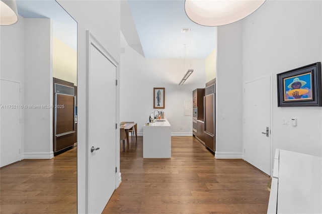 475 Brickell Ave Unit 2809, Miami, FL 33131 - hall with dark wood-style flooring and a sink
