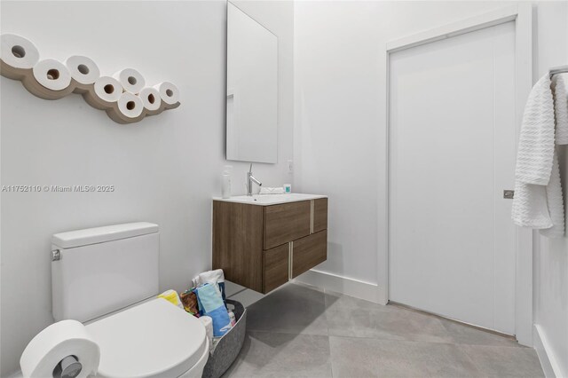 475 Brickell Ave Unit 2809, Miami, FL 33131 - bathroom with vanity, toilet, and baseboards