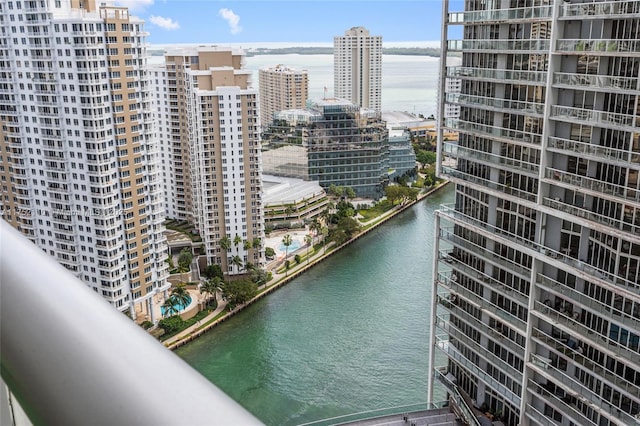 exterior space with a water view and a view of city