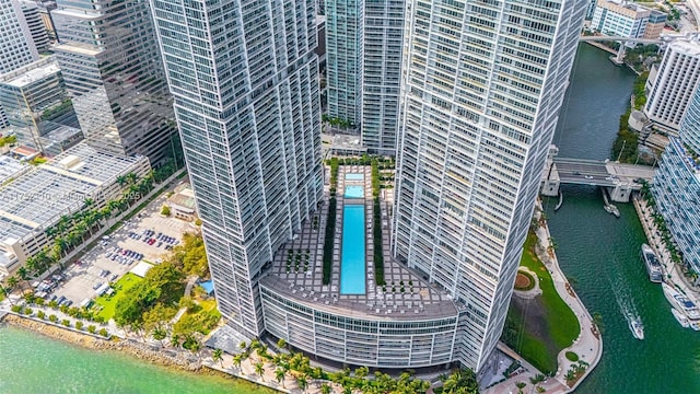 aerial view featuring a water view and a city view