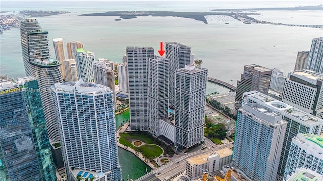 aerial view featuring a water view and a city view