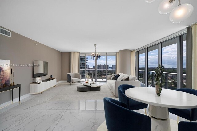 300 Sunny Isles Blvd Unit 4-1208, Sunny Isles Beach, FL 33160 - dining room with a chandelier, light marble finish floors, and a wall of windows