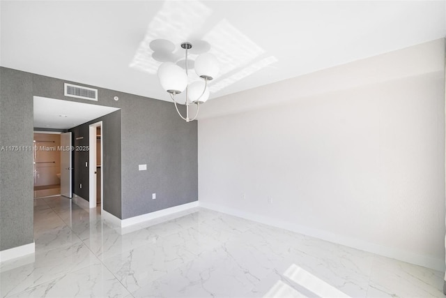 300 Sunny Isles Blvd Unit 4-1208, Sunny Isles Beach, FL 33160 - empty room with light marble finish flooring and a chandelier