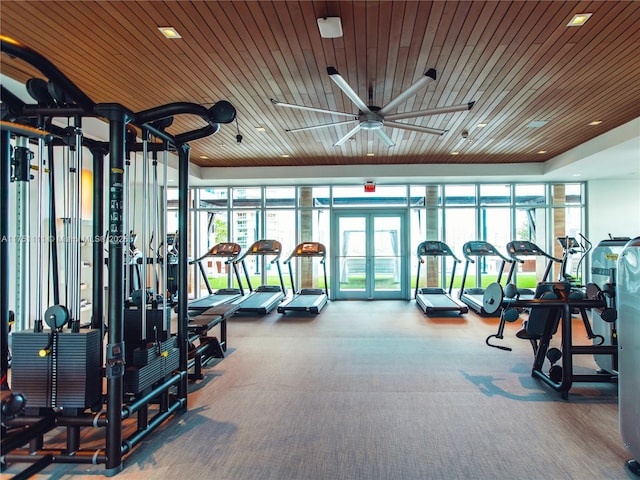 exercise room with wooden ceiling and french doors