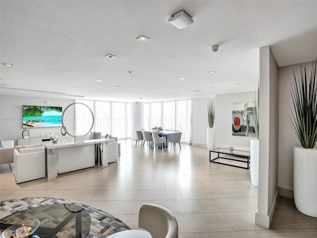 300 Sunny Isles Blvd Unit 4-1208, Sunny Isles Beach, FL 33160 - living room featuring a wall of windows and recessed lighting