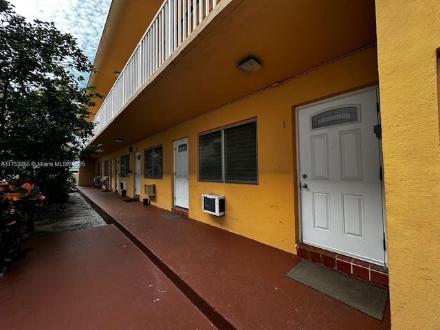 exterior space featuring a patio and stucco siding