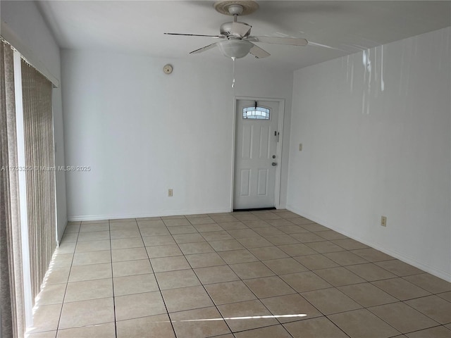 empty room featuring ceiling fan