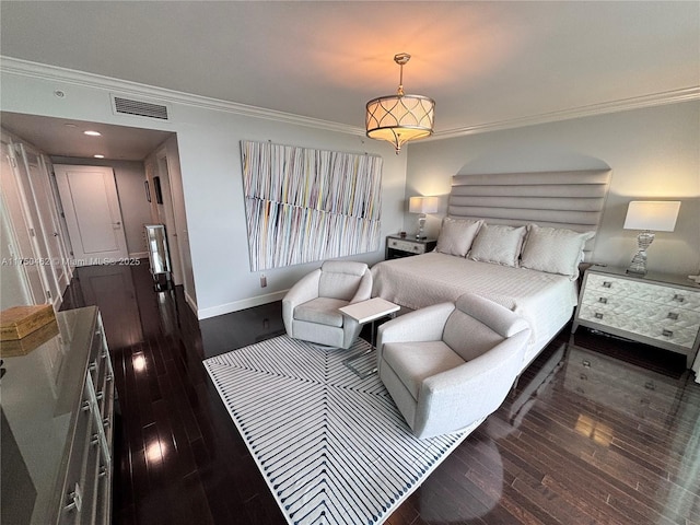 bedroom with dark wood-type flooring, visible vents, ornamental molding, and baseboards