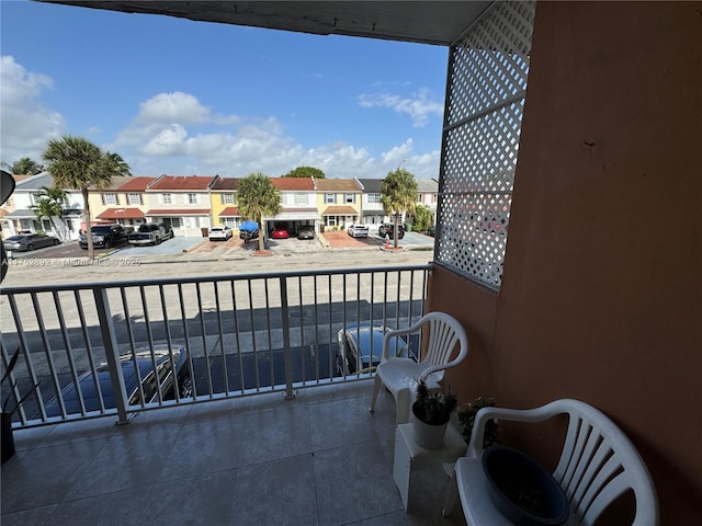 balcony featuring a residential view