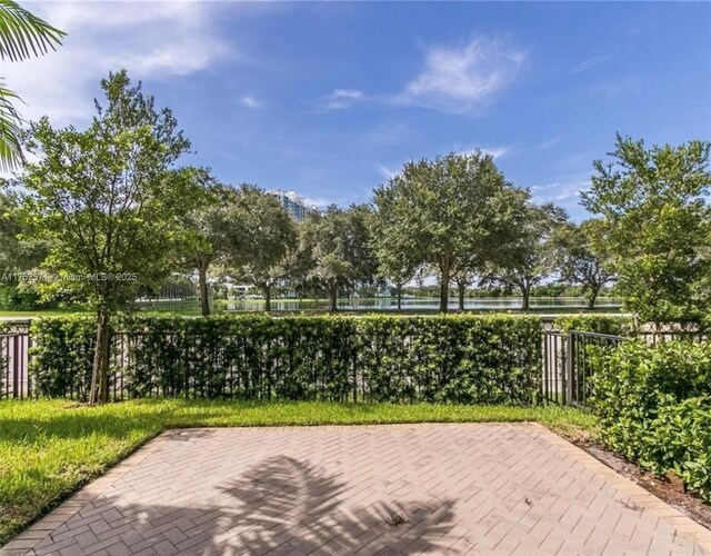2910 NW 124th Way Unit 2910, Sunrise, FL 33323 - view of property's community with a patio
