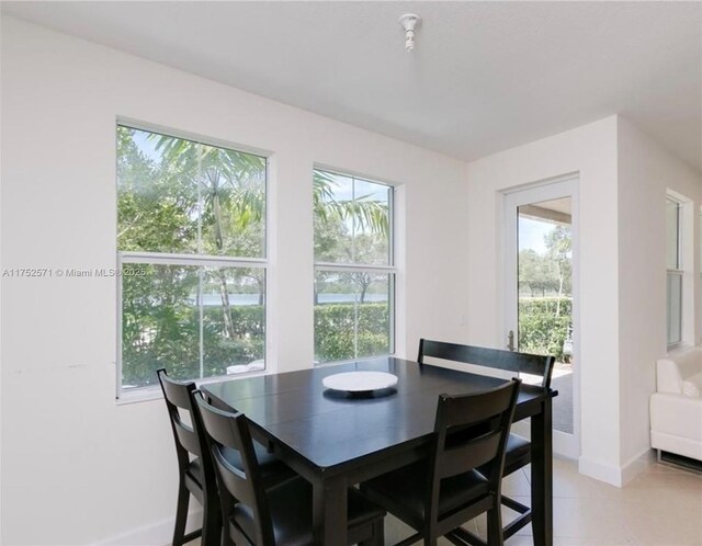 2910 NW 124th Way Unit 2910, Sunrise, FL 33323 - dining room with baseboards and healthy amount of natural light