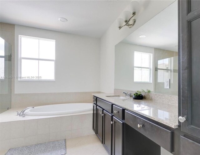 2910 NW 124th Way Unit 2910, Sunrise, FL 33323 - full bathroom with a bath, vanity, and tile patterned floors