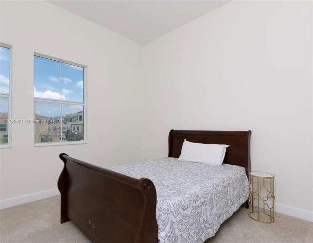 2910 NW 124th Way Unit 2910, Sunrise, FL 33323 - carpeted bedroom with baseboards