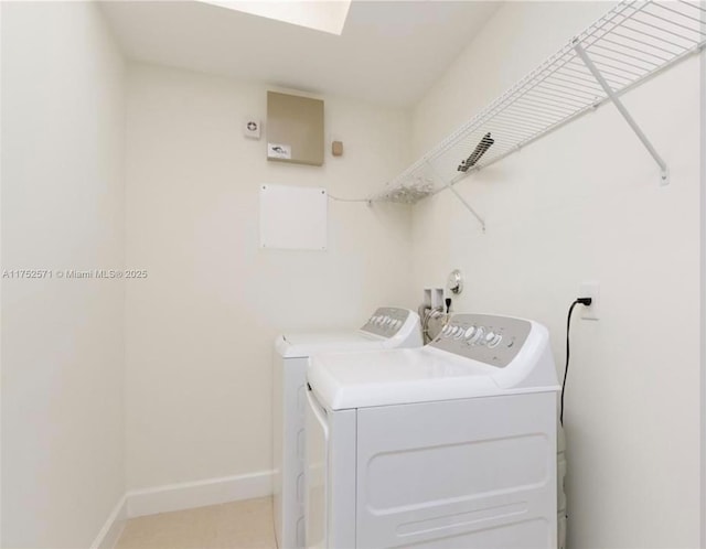 2910 NW 124th Way Unit 2910, Sunrise, FL 33323 - washroom with washing machine and dryer and baseboards