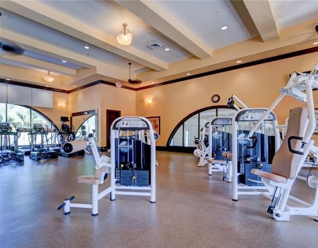 2910 NW 124th Way Unit 2910, Sunrise, FL 33323 - gym with crown molding, beamed ceiling, and recessed lighting