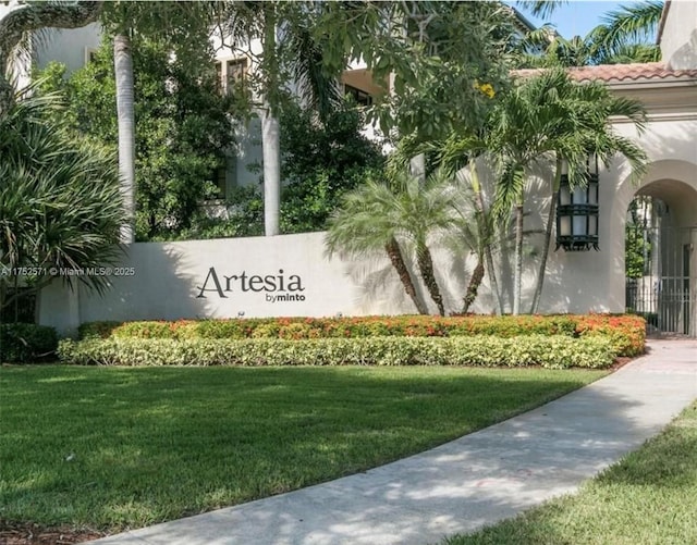 2910 NW 124th Way Unit 2910, Sunrise, FL 33323 - community sign featuring a yard