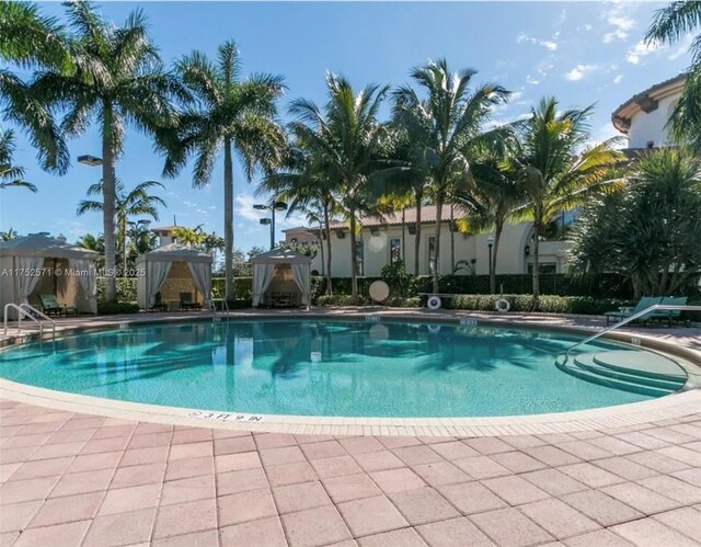 2910 NW 124th Way Unit 2910, Sunrise, FL 33323 - community pool featuring a gazebo and a patio