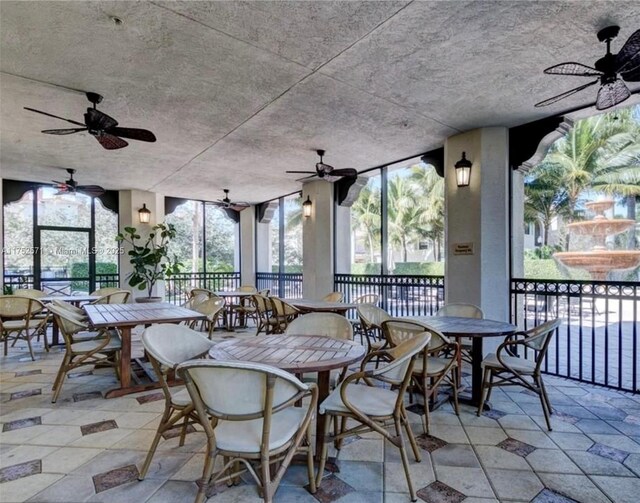 2910 NW 124th Way Unit 2910, Sunrise, FL 33323 - view of patio / terrace featuring a ceiling fan and outdoor dining space