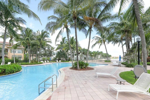 2910 NW 124th Way Unit 2910, Sunrise, FL 33323 - community pool with a patio area