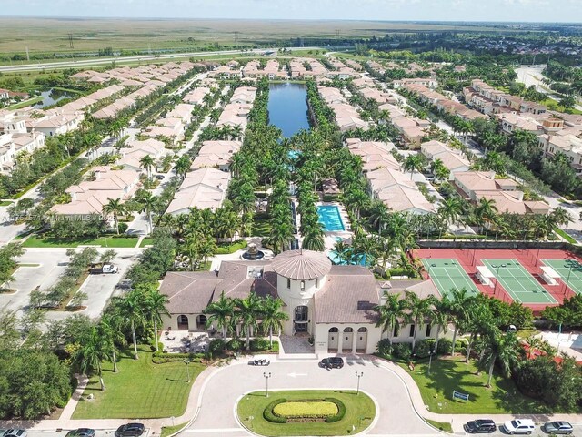 2910 NW 124th Way Unit 2910, Sunrise, FL 33323 - aerial perspective of suburban area with a nearby body of water