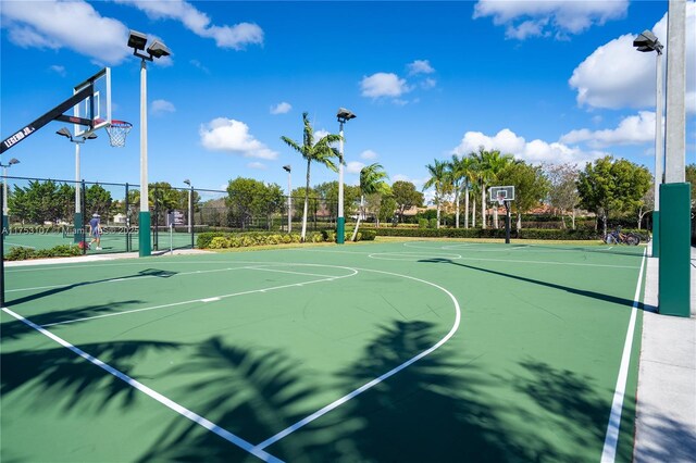 view of sport court with community basketball court and fence