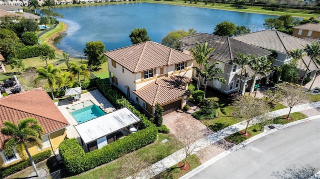 bird's eye view featuring a residential view and a water view