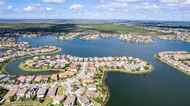 aerial view featuring a water view and a residential view