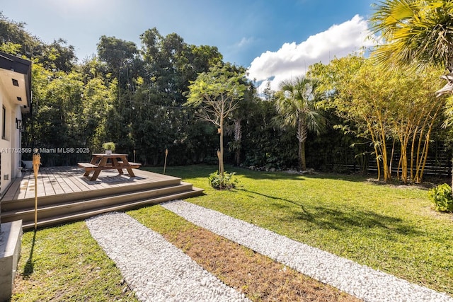 view of yard featuring a deck