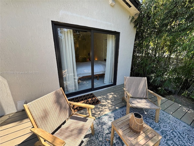 view of patio / terrace featuring a wooden deck