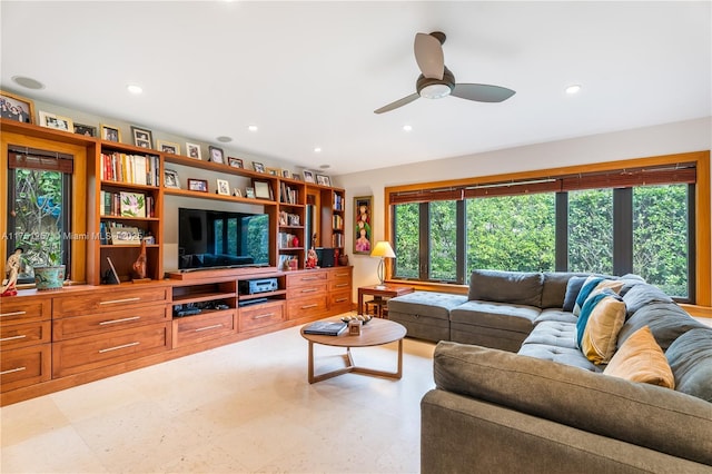 living area with recessed lighting and ceiling fan