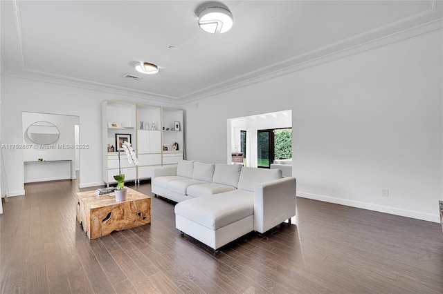 living room featuring baseboards, dark wood-type flooring, visible vents, and crown molding