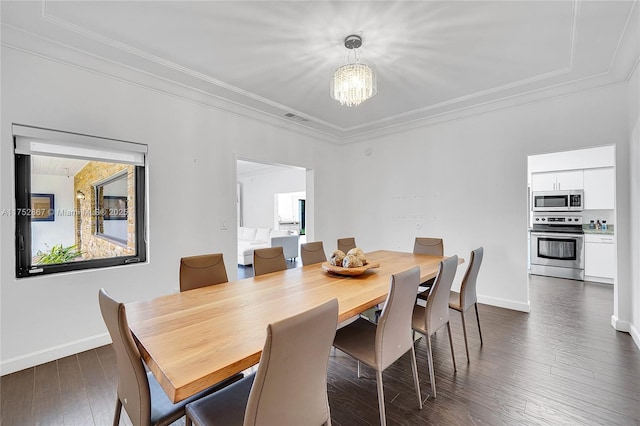 1915 S Miami Ave, Miami, FL 33129 - dining area with a chandelier, crown molding, baseboards, and dark wood-style floors