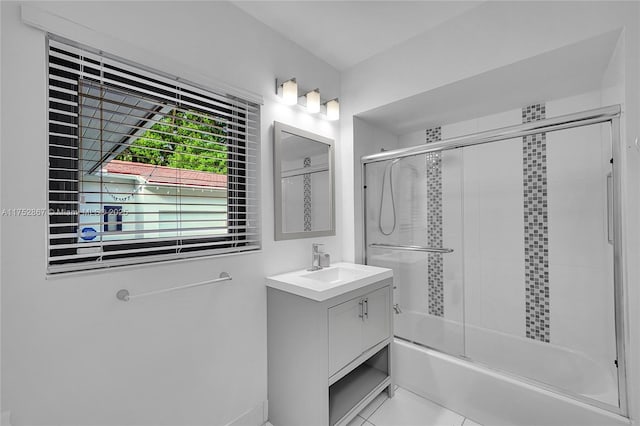 1915 S Miami Ave, Miami, FL 33129 - full bathroom with vanity, shower / bath combination with glass door, and tile patterned floors