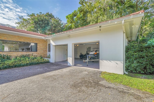 garage with driveway