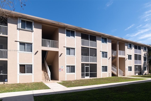 view of building exterior with stairway