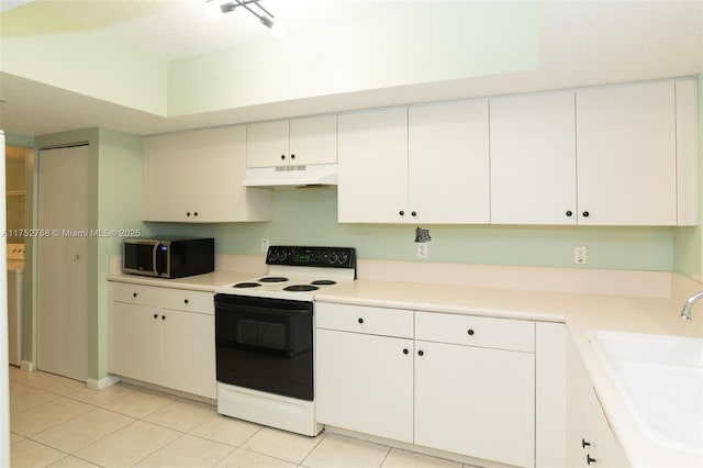 kitchen with electric stove, stainless steel microwave, white cabinetry, a sink, and under cabinet range hood