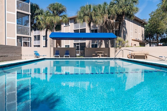 community pool with fence